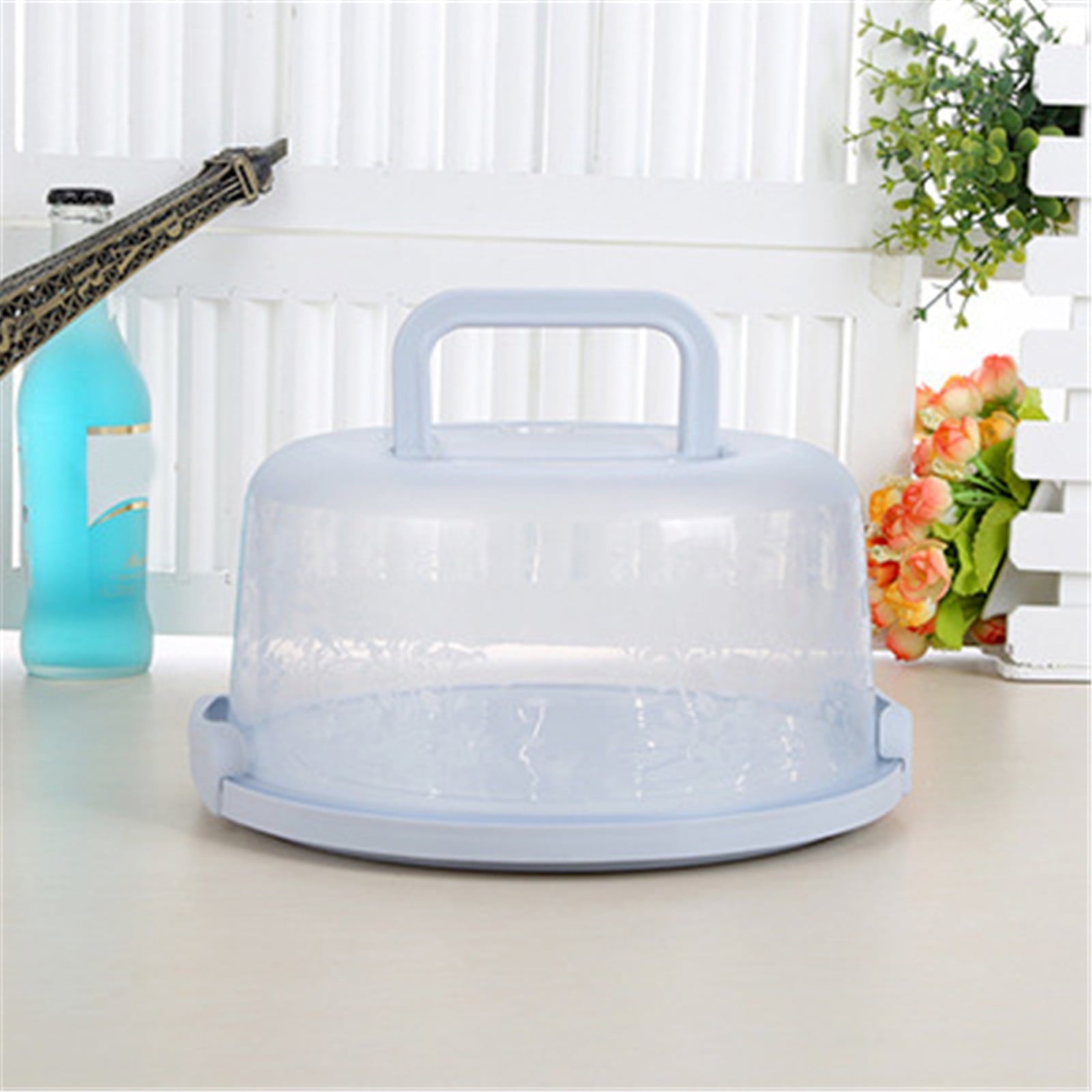 10 Inch Round Cake Box with Lid in blue with foldable handle, ideal for transporting cakes.